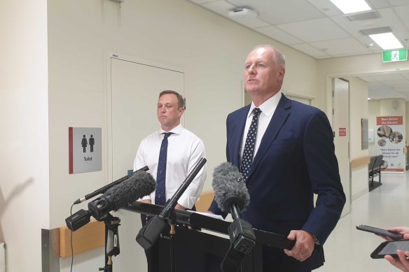 Then-Health Minister Steven Miles with Queensland Health director-general John Wakefield, who stood down from the role last month.