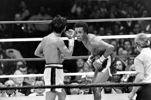 Sugar Ray Leonard taunts at Roberto Duran in the ring in a 1980 championship fight.