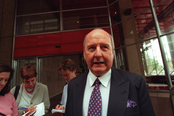 Alan Jones leaves court in 2004.