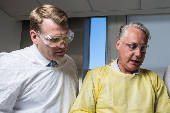 Concussion expert Chris Nowinski, left, with Michael Buckland in 2018. 