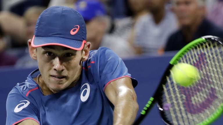 Tumultuous: Alex de Minaur overcame a fickle opponent in China.