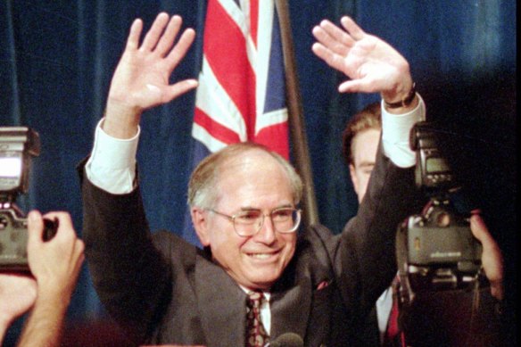 Liberal Party leader John Howard waves to the crowd after his victory in the 1996 election.