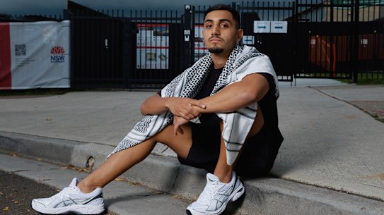 Former Condell Park High School student Jad Salamah has reached a confidential settlement with the Department of Education  after being banned from his school formal for wearing a keffiyeh-patterned scarf to his graduation.