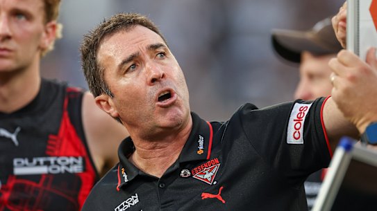 Take a stand: Essendon coach Brad Scott wants his players to change the perception the Lions had of them.
