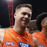 Toby Bedford and Harry Himmelberg celebrate the Giants’ win over Fremantle.