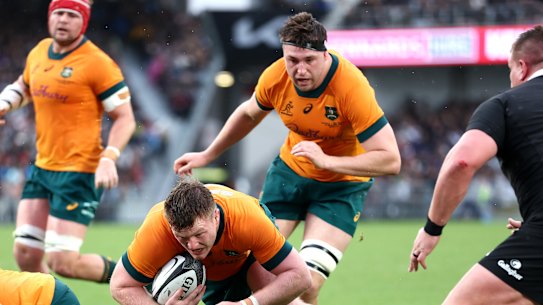 Billy Pollard of Australia dives towards the tryline