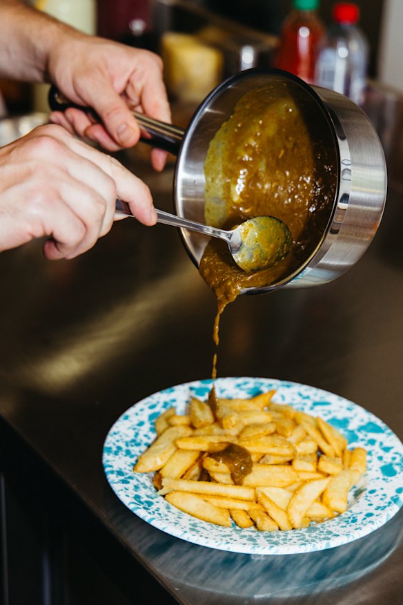 Chips with curry gravy. 