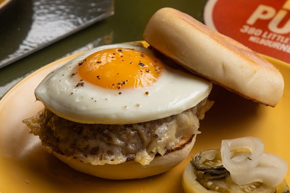 An all-day breakfast muffin with cotechino sausage, comte and egg at Le Pub, which recently opened on Hardware Lane.