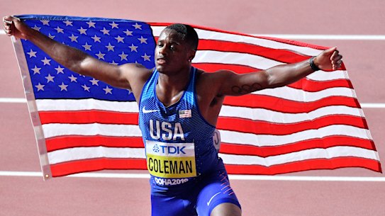 Christian Coleman celebrates his 100m victory at last year's World Athletics Championships in Doha.