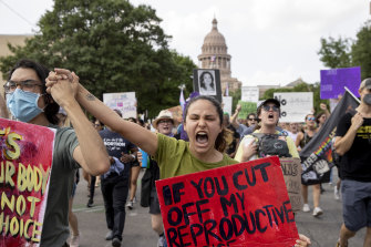 Protesters rally outside a federal courthouse in Austin, Texas, over the Supreme Court decision to overturn Roe v Wade.