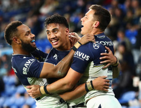 Murray Tuilagi (centre) celebrates his first-half try against the Titans.