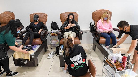 Monty Howe (left) and mates getting in early for a pedicure at Venus Nails Salon on Chapel Street. 