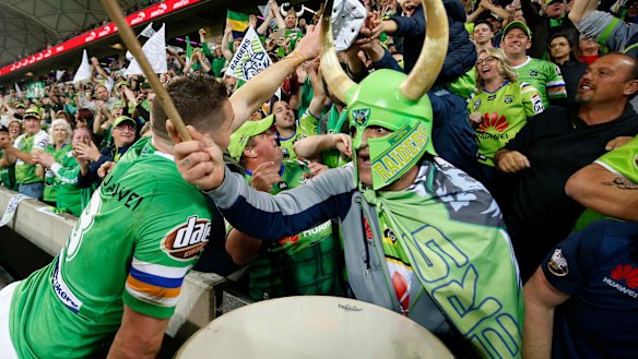 Raiders fans celebrate with Jarrod Croker in Melbourne.