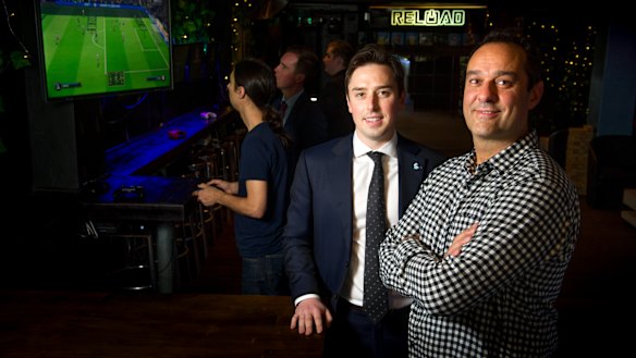 MLA Michael Pettersson wants to capture a corner of the booming Asian tourism market in video gaming as a spectator sport. Pictured with Reload co-owner Ravi Sharma.