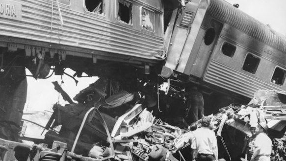 Two lesser damaged carriages of the Aurora straddle the ruin of a third carriage and part of the goods train.