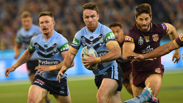 Strong showing: James Maloney runs the ball.