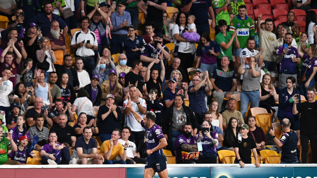 Cameron Smith waves to the crowd after being replaced with five minutes to go.