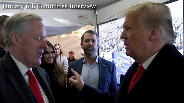 Then-president Donald Trump talking to his chief of staff Mark Meadows before Trump spoke at the rally on the Ellipse that preceded the US Capitol riot on January 6, 2021.
