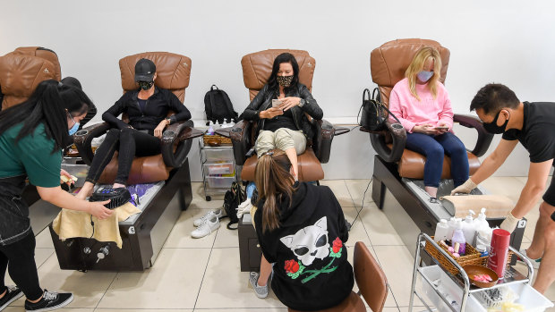 Monty Howe (left) and mates getting in early for a pedicure at Venus Nails Salon on Chapel Street. 