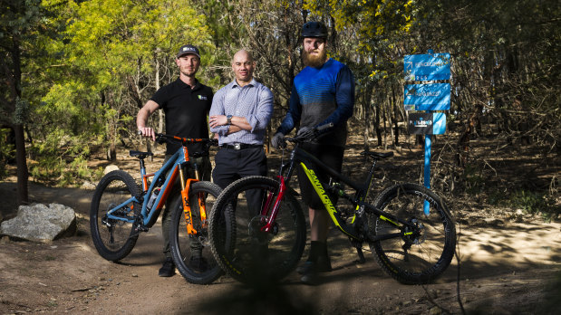 Mountain bikers Ryan Walsch, Michael Clark and Josh Kentwell. who say there is a need for more challenging trails in Stromlo Forest Park.
