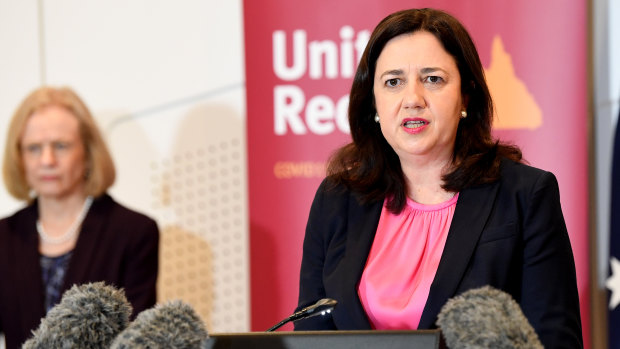Premier Annastacia Palaszczuk (right) speaks at a press conference with Dr Jeannette Young (left) on June 30.