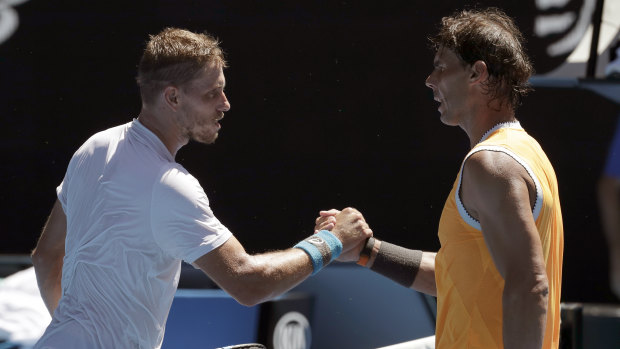 James Duckworth congratulates Rafael Nadal, after their first round match in Melbourne on Monday.