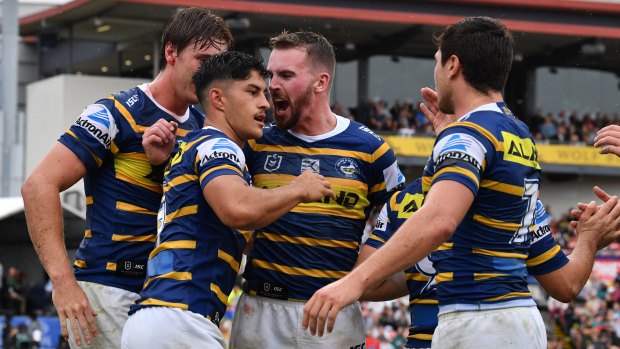 Make yourself at home: Dylan Brown, front left, looked the part in his first NRL outing in the blue and gold. 
