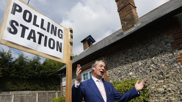 Brexit Party leader Nigel Farage outside a polling station on Thursday. 