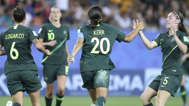 Australia's Sam Kerr, second right, celebrates after scoring her side's second goal.