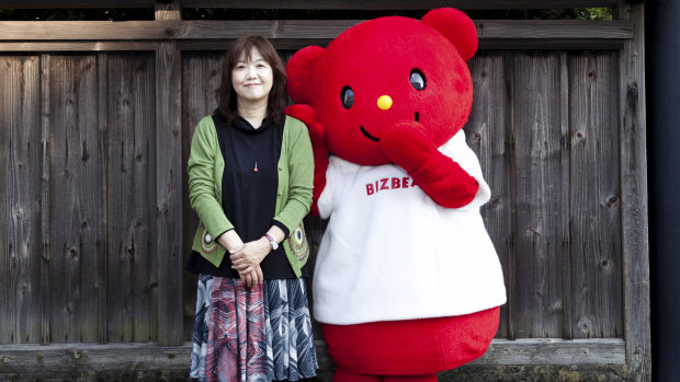 Hiromi Kano with a mascot made by Kigurumi.biz, her factory in Miyazaki, Japan, November.