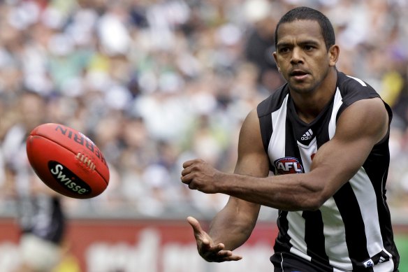 Davis in action for the Pies.