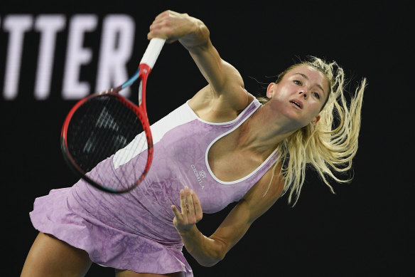 Camila Giorgi is all concentration as she serves.