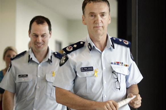 Pope (left) with then-deputy commissioner of the Office of Police Integrity, Sir Ken Jones, in 2010. 