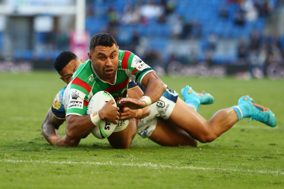 South Sydney’s Alex Johnston dives over for a try against the Gold Coast.