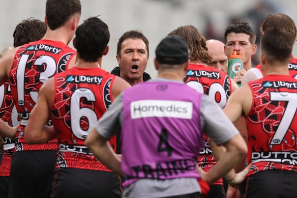 Brad Scott during his quarter-time address. 