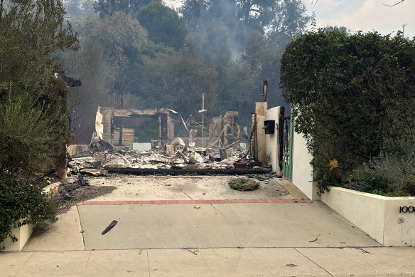 In a photo provided by Alec Egan shows his home, which was destroyed in a fire, and with it the artworks he had created for a show.