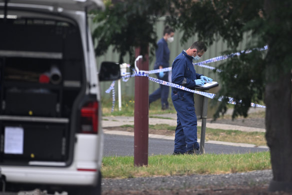 Police at the scene of a Wyndham Vale home where two men were killed on Saturday morning.
