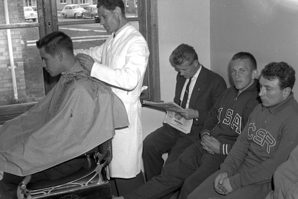 A classic Australian barbershop in 1956. Add some carcinogenic fumes, and voila!