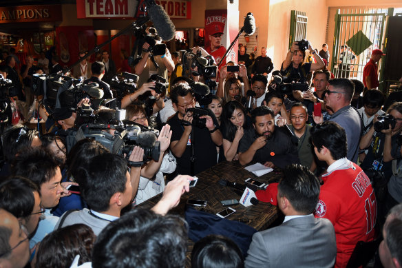 Shohei Ohtani fronts a massive pack of reporters after he was unveiled by the Angels in 2017.
