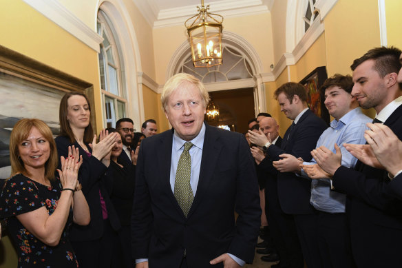 Boris Johnson was greeted with applause as he returned to Number 10 after the 2019 election victory.