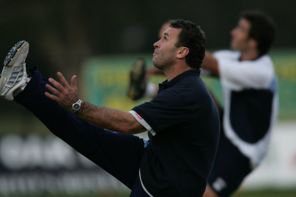 Ricky Stuart and Andrew Johns kicking during an Origin training session in 2005