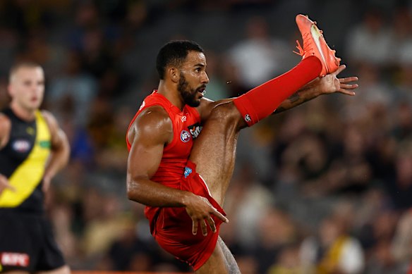 Former Gold Coast skipper Touk Miller in action against the Tigers.