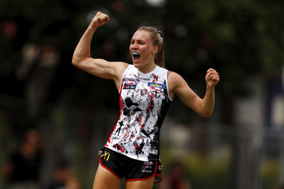 Molly McDonald celebrates a goal en route to the Saints’ first win of the season.