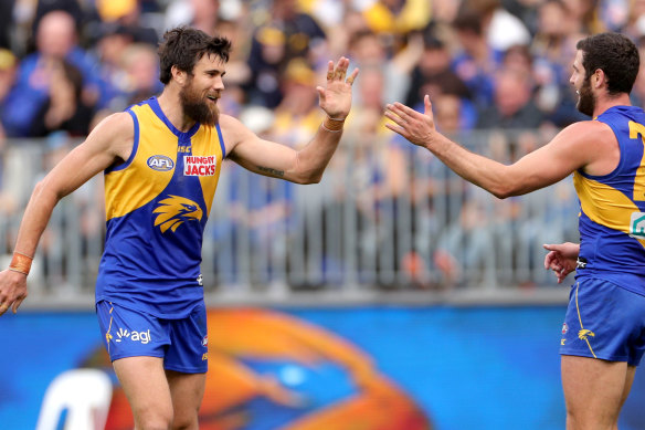 Josh Kennedy (left) of the Eagles is congratulated by Jack Darling after scoring a goal against North Melbourne.