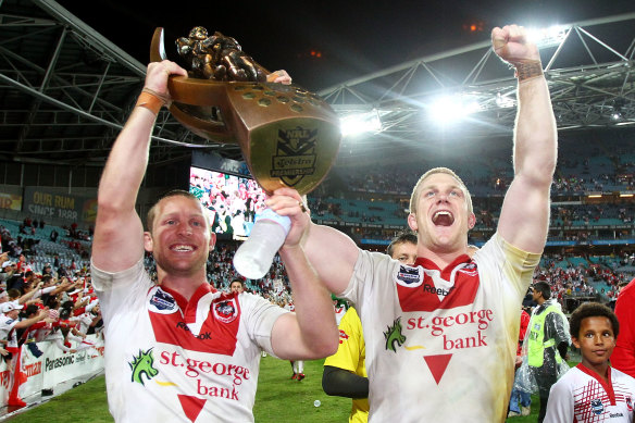 Ben Creagh lifts the premiership trophy with Ben Hornby in 2010.