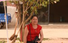 Local fruit picker Yula, works for Australian fresh food retailer Costa in Yunnan.
