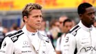 Brad Pitt and Damson Idris filming the F1 movie during the British Grand Prix in 2023.