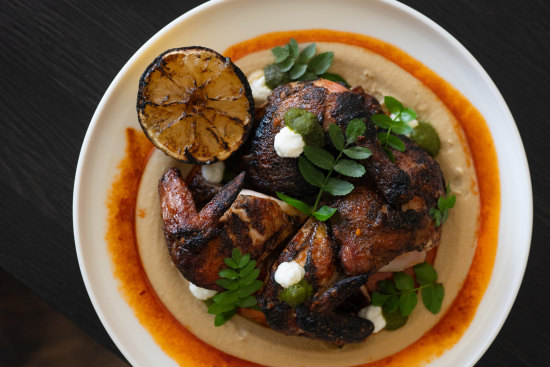 Yellow Billy restaurant cooks much of the menu over custom fire pits.