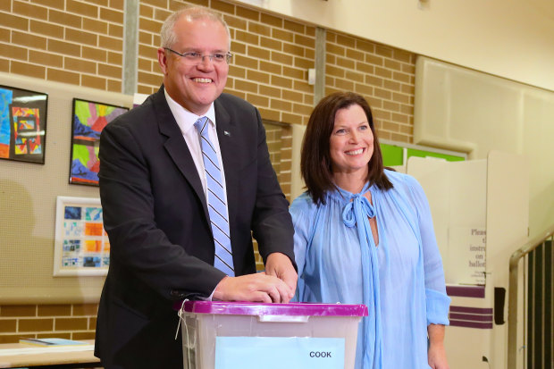 Scott Morrison and wife Jenny on polling day in 2019. While polls and betting markets missed the result, economic models picked a Coalition victory.