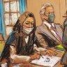 Maxwell, sitting between members of her legal team, makes a sketch of the court artist.